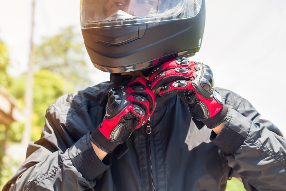 Photo of a Man in a Motorcycle Helmet